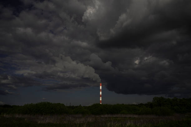 Low angle view of stormcloud above the chimney.