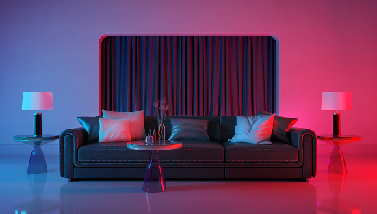 Modern room with violet light and red light illumination.Leather sofa with pillows and table lamps.3d rendering