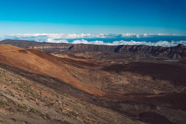 istock Scenic View Of Dramatic Landscape Against Blue Sky 1244614760