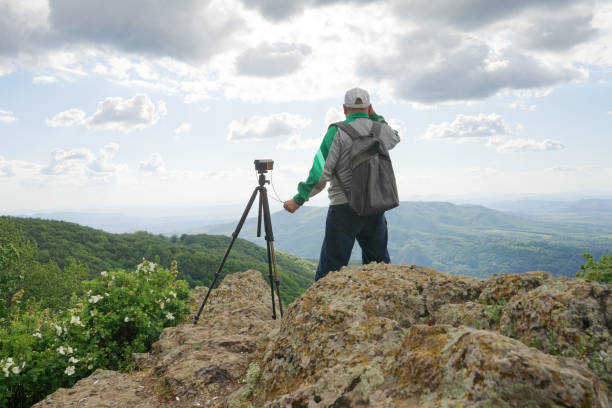 istock A Man Taking Picture In The Mountain 1244615939
