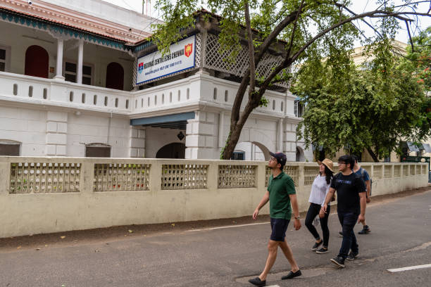 Tourists walking inside Fort St. George Chennai, Tamil Nadu, India - August 2018: Tourists sightseeing insdie the old colonial complex of Fort St. George. chennai photos stock pictures, royalty-free photos & images