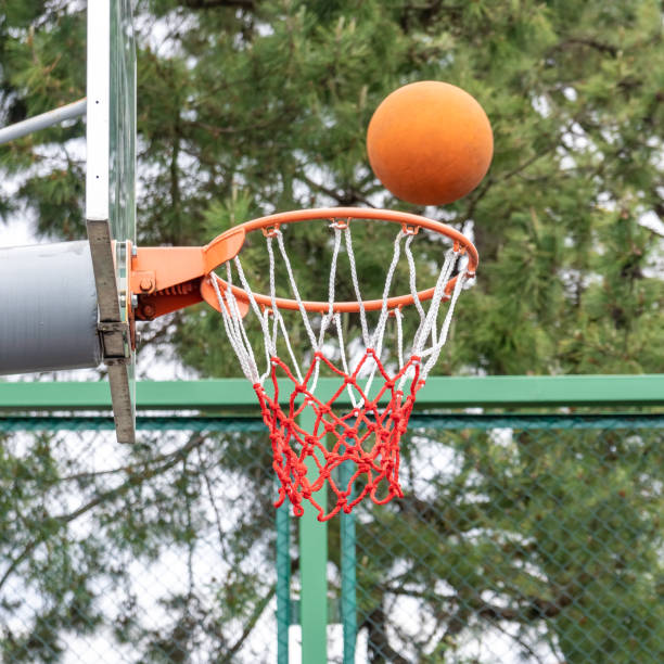 istock Basketball ring with a net and ball, sport 1244663071