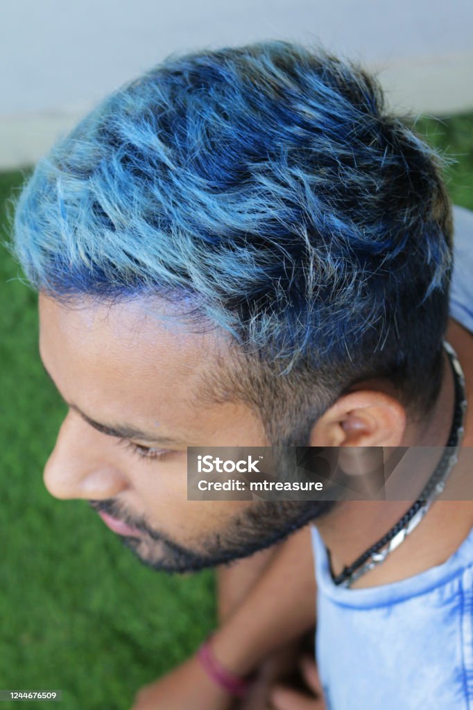 Image Of Handsome Hindu Man With Blue Hair In Early 20s Side Profile Smiling Short Beard Dyed Bleached Messy Electric Blue Coloured Hair Closeup Portrait Of Good Looking Guy In Blue Tshirt Image Of Handsome Hindu Man With Blue Hair In Early 20s Side Profile Smiling Short Beard Dyed Bleached Messy Electric Blue Coloured Hair Closeup Portrait Of Good Looking Guy In Blue Tshirt
