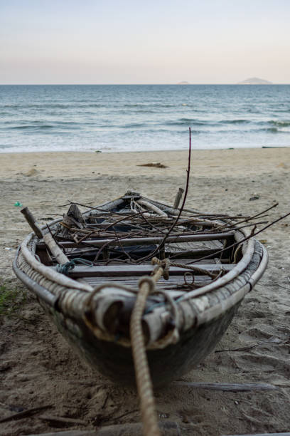 istock Fishing Boat on the Beach 1244678714