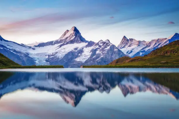 Great view of the snow rocky massif. Popular tourist attraction. Dramatic and picturesque scene. Location place Bachalpsee in Swiss alps, Grindelwald valley, Bernese Oberland, Europe. Beauty world.