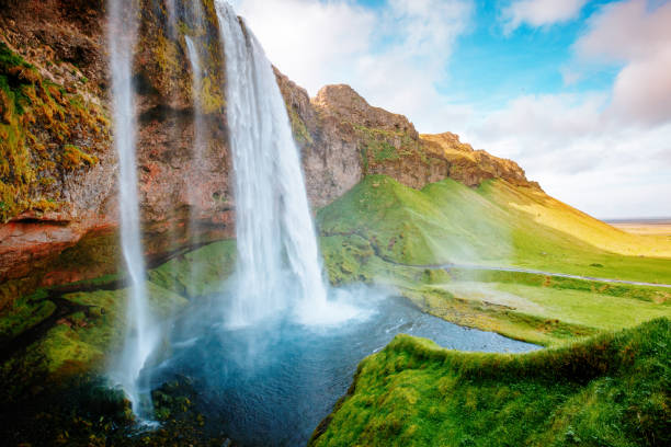 istock Perfect view of famous powerful Seljalandsfoss waterfall in sunlight. 1244700784