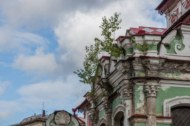 istock The old destroyed building with a balcony with columns 1244703963