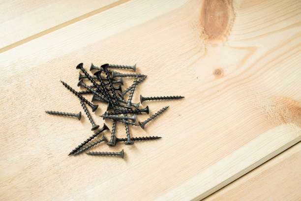 istock Screws for wooden boards. Carpentry workshop 1244710767