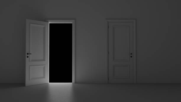 istock 3d render open door in dark room on a black background 1244727525
