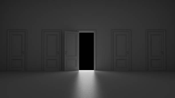 istock 3d render open door in dark room on a black background 1244728596
