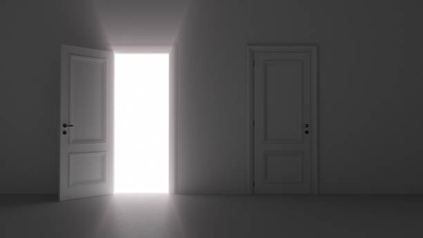 istock 3d render open door shine in dark room 1244728625