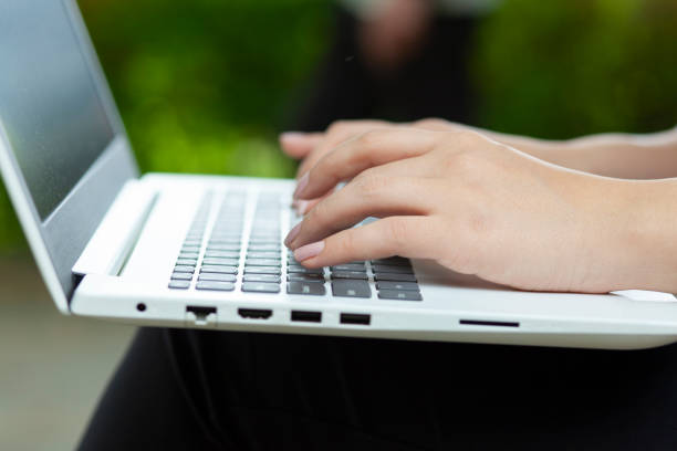 istock woman working in computer in street 1244734830