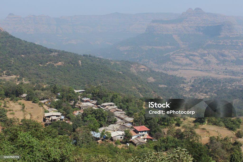 View of Raigadwadi village, near Raigad Fort, Maharashtra, India Fort Stock Photo