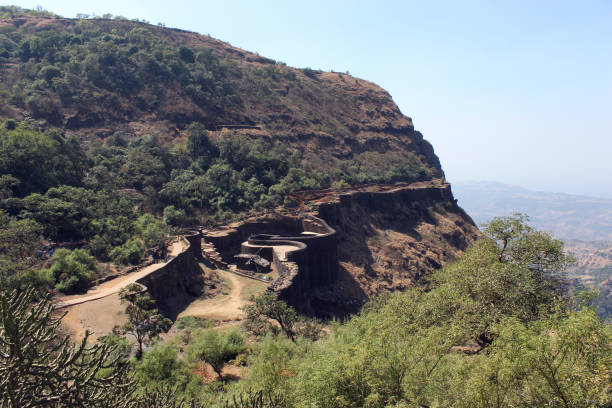 Raigad fort walls and bastion, Raigad, Maharashtra, India.  350-year-old majestic fort of Chhatrapati Shivaji with 1737 steps to climb, 1,300 acres and largest fort complexes  in India Raigad fort walls and bastion, Raigad, Maharashtra, India.  350-year-old majestic fort of Chhatrapati Shivaji with 1737 steps to climb, 1,300 acres and largest fort complexes  in India aurangabad maharashtra photos stock pictures, royalty-free photos & images