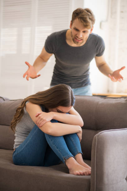 istock Young bearded man shouting on his upset wife and blaming her 1244754551