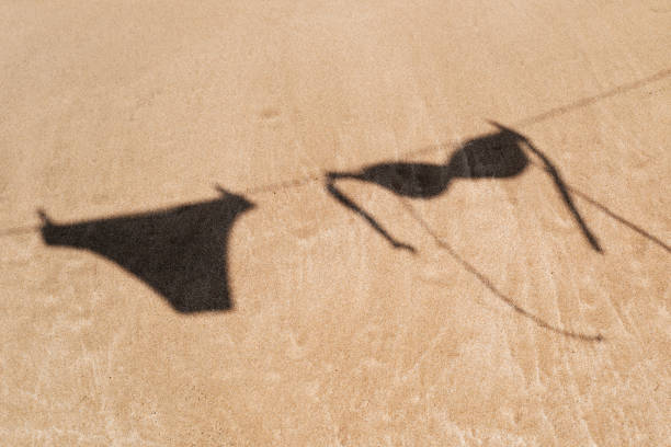 istock bikini hanging on a clothes line on the beach 1244757320
