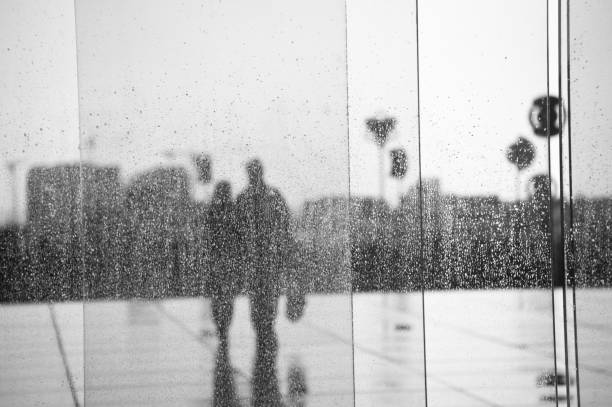 istock Couple in rainy day 1244762231