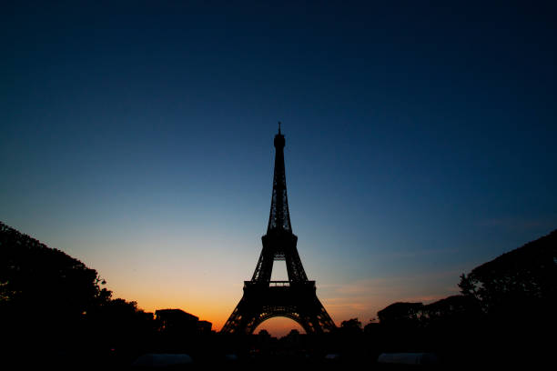 istock Silhouette of the Eiffel Tower at sunset 1244762941