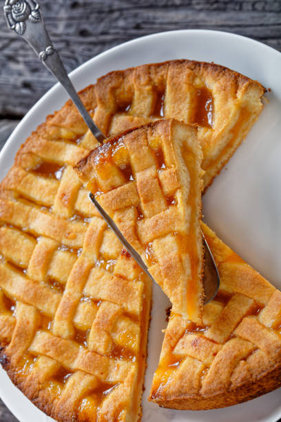 istock sweet apricot shortcrust pie with a lattice pie crust topping 1244802836