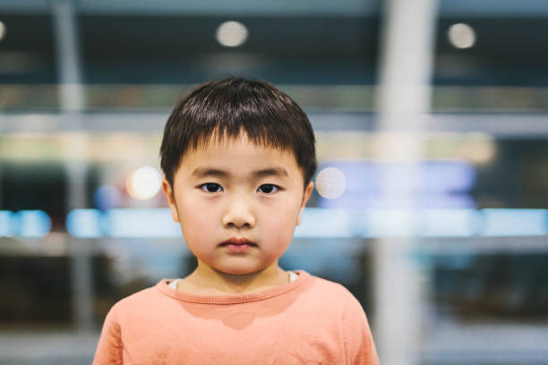 Asian boy in the airport.