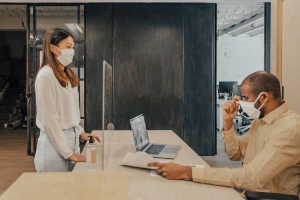 istock People working with mask during the Covid-19 1244825132