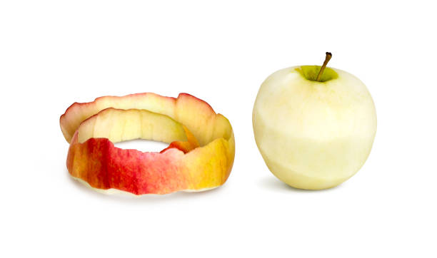 istock Peeled red apple with peel on a white background 1244832440