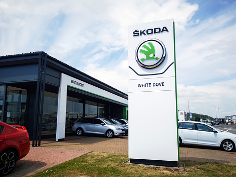Cardiff, UK: June 02, 2020: Skoda Car Dealership with new and used cars for sale. ŠKODA AUTO, more commonly known as Škoda, is a Czech automobile manufacturer founded in 1895. Its headquarters are in Mladá Boleslav, Czech Republic.
