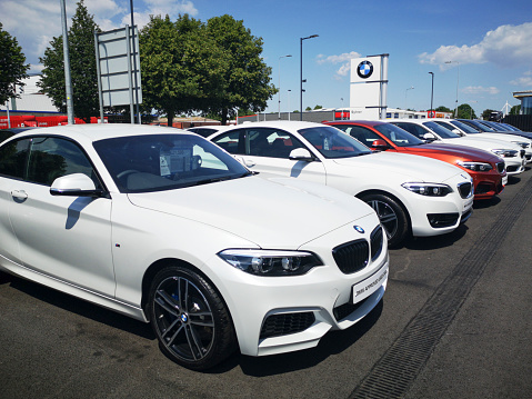 Cardiff, UK: June 02, 2020: BMW car dealership on Penarth Road in Cardiff. BMW is a German multinational company which produces luxury vehicles and motorcycles.