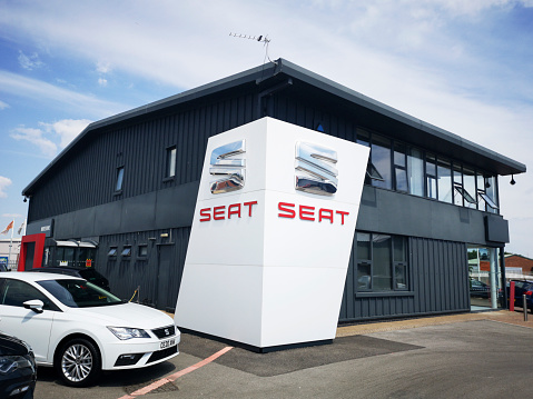 Cardiff, UK: June 02, 2020: SEAT Car Dealership with new and used cars on sale. SEAT is a Spanish automobile manufacturer with its head office in Martorell, Spain and was founded in 1950.