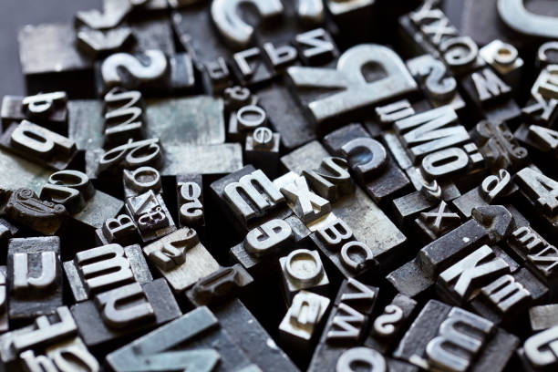 istock Metal letterpress type background 1244879060