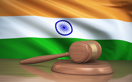 3d Render Judge Gavel and india flag on background (close-up)