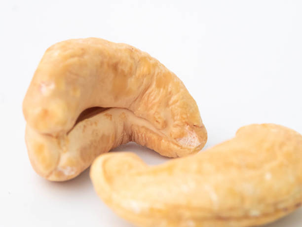 istock Close-up of cashew nut isolated on white background. 1244898970