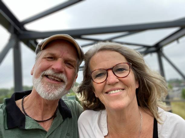 istock Walking happy couple 1244900841