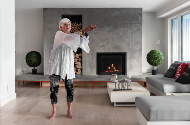 istock Senior woman doing tai chi 1244903884