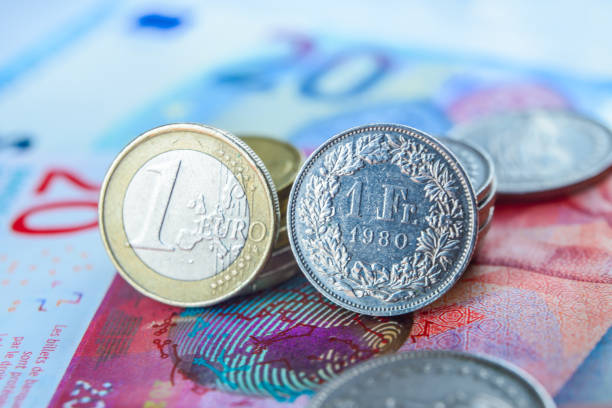 Swiss Francs and Euro stock photo