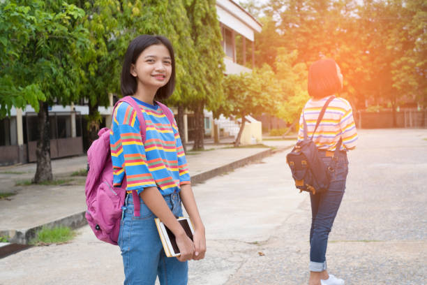 istock Happy student at school, Asian girl. 1244913706