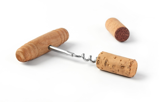 Wine cork and bottle opener  on white background