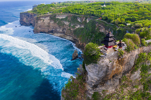 Bali, Pura luhur - temple on the cliff edge in Uluwatu. Ocean on the background.