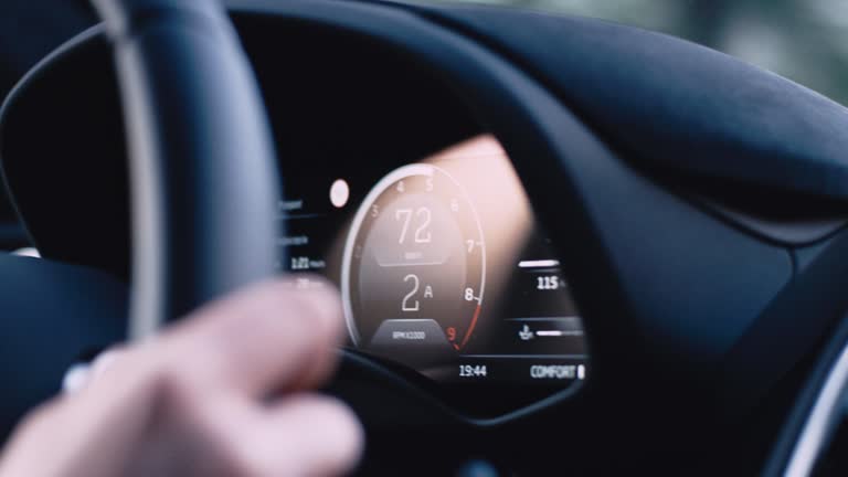 Driver in a vintage car. Interior details