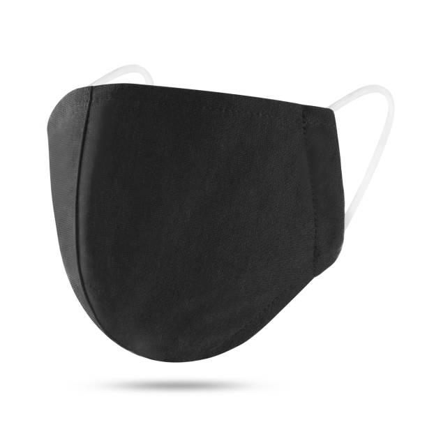 istock Blank black cotton reusable cloth mask isolated on white background. Front view. Empty surgical mask for mockup. Clear protective face mask for template & branding. 1244936177