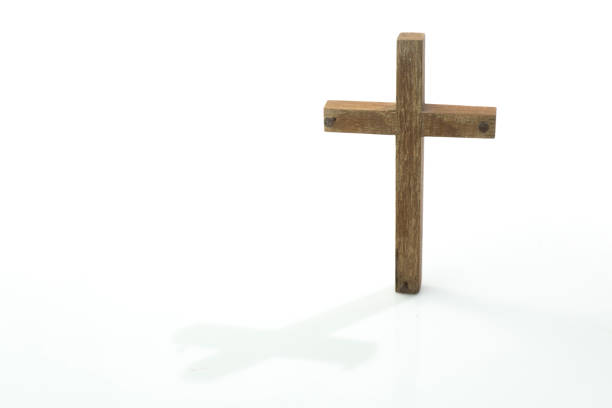 istock Wooden cross on white background 1244936915