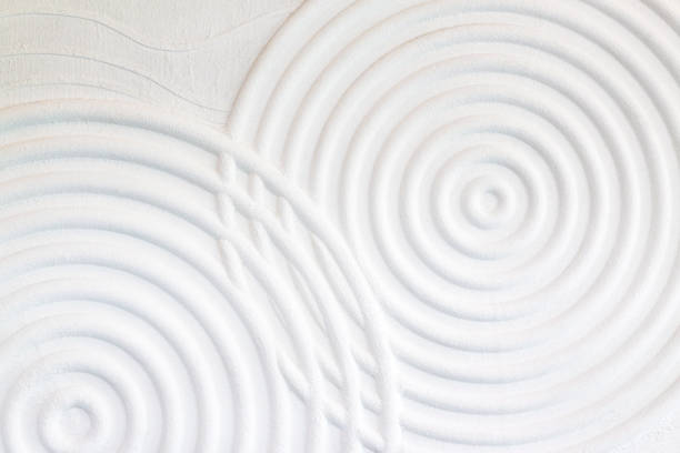 istock Decorative white cement wall background of abstract waves. 1244937836