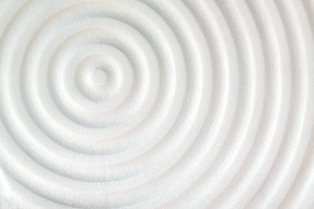 istock Decorative white cement wall background of abstract waves. 1244937840