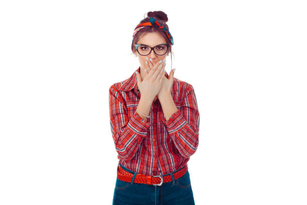 istock Surprised young woman covering mouth with hands. 1244945127