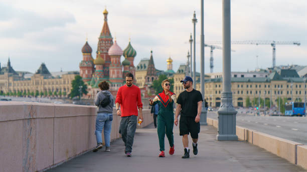 Moscow, Russia - May 30, 2020: Moscow downtown. Almost no people, traffic at Bolshoy Moskvoretsky Bridge. Coronavirus pandemic lifestyle. Saint Basil's Cathedral / Cathedral of Vasily the Blessed