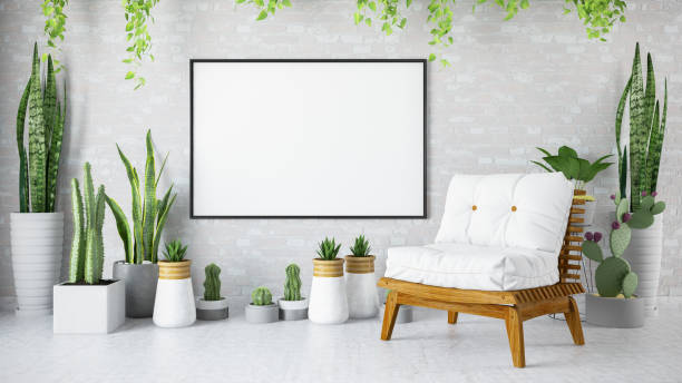 istock Empty Frame in Living Room with Green Plants and Armchair 1244963806
