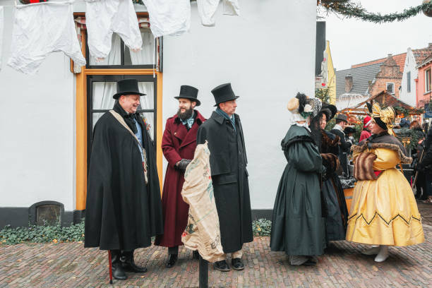 Characters from the famous books of Dickens during the Dickens Festival Deventer, Netherlands, December 15, 2018: Characters from the famous books of Dickens during the Dickens Festival in Deventer in The Netherlands deventer photos stock pictures, royalty-free photos & images