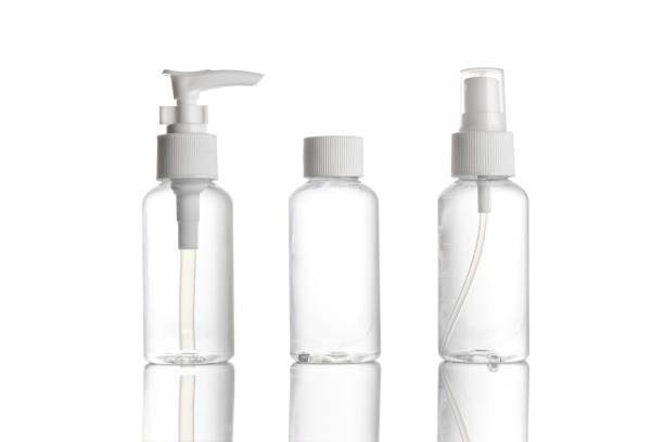 istock Sanitizer bottle. Empty clear plastic pump container for antiseptic gel, cosmetic soap and mineral shampoo isolated on white. Water cap blank spray on transparent background. 1244973269