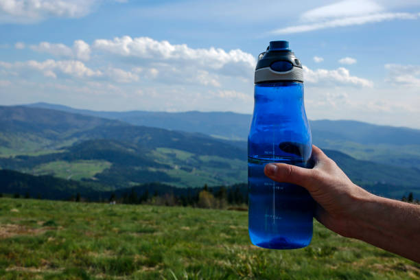 istock sport water bottle in the mountains 1244991842