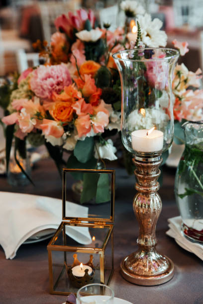 istock Beautiful, decorated table with flower decorations.  Wedding or party decorations. 1245021825